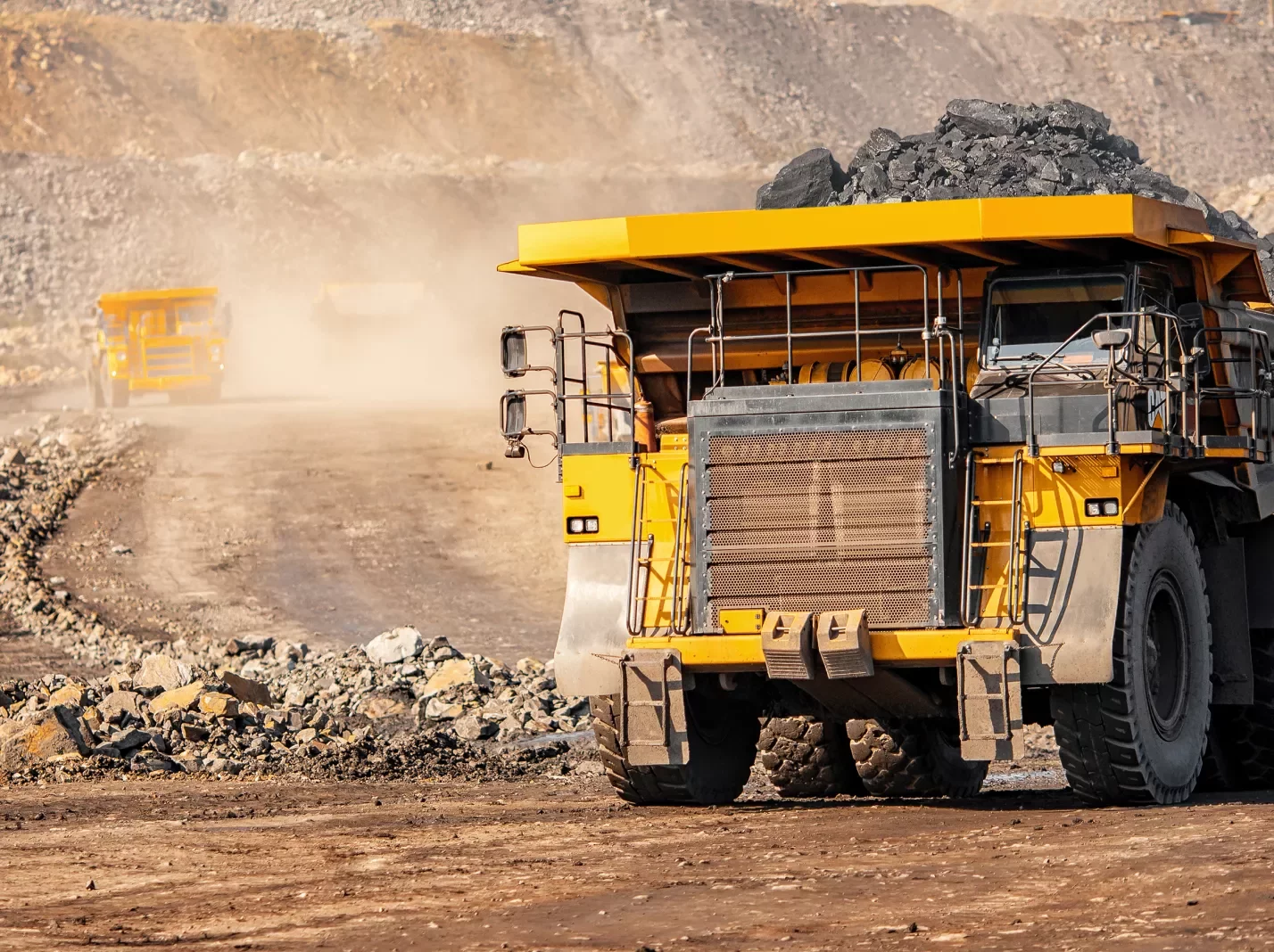 Mine safety heavy truck driving at mining site