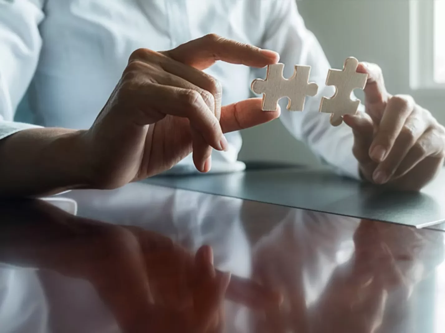 Puzzle fitting pieces together