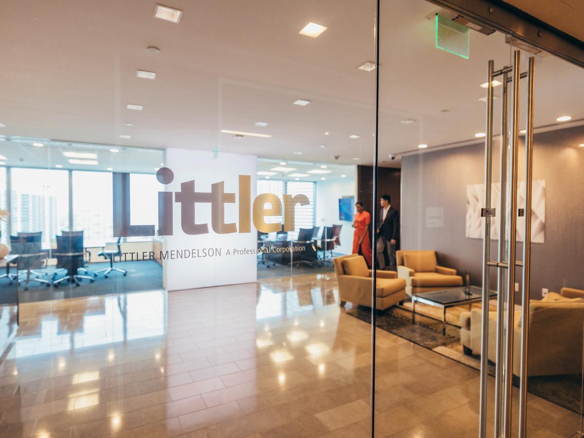 Littler office space glass doors into lobby
